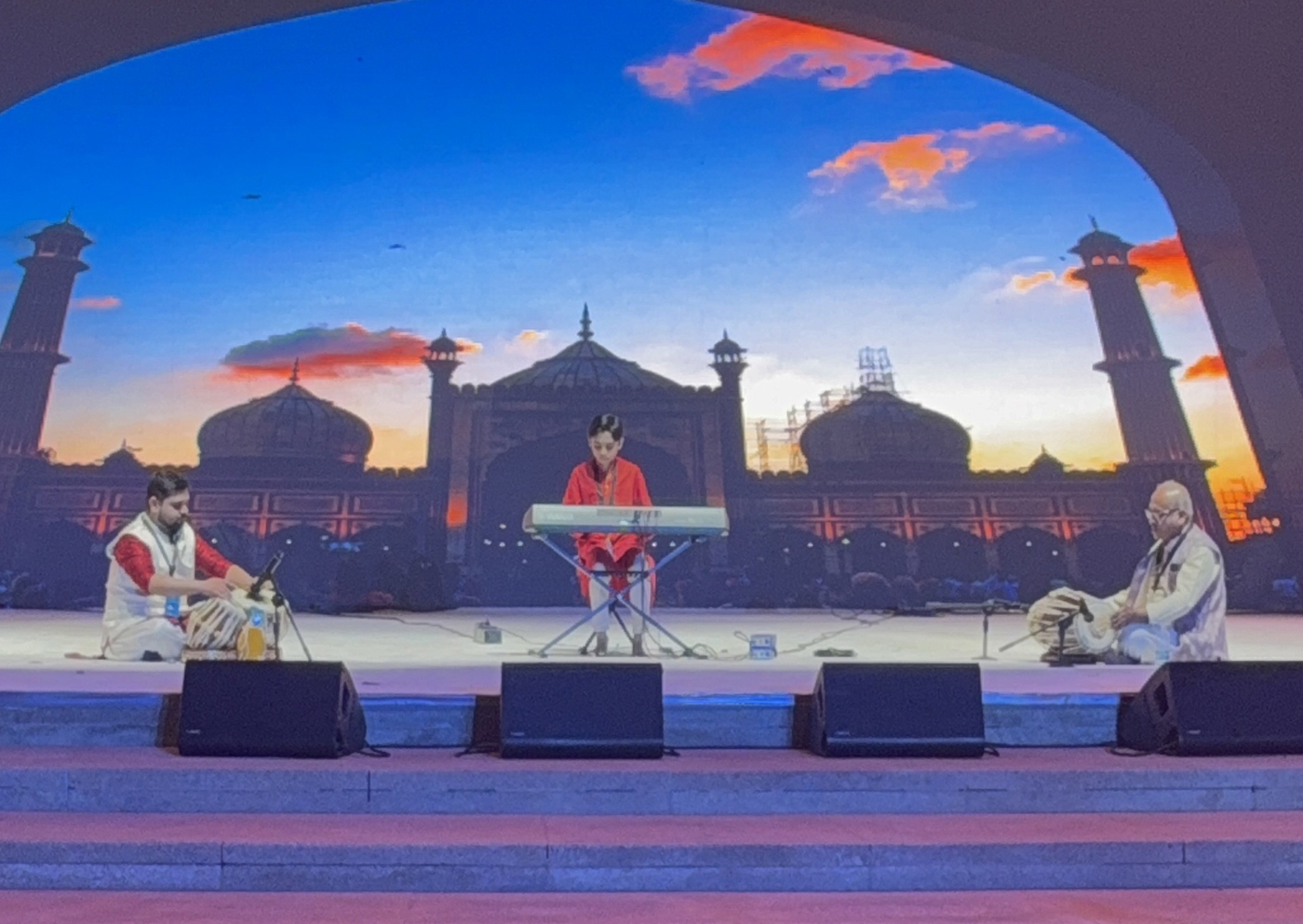 Viaan Ghorpade performing Indian classical rendition of Raag Yaman on keyboard at a concert in Abu Dhabi with Guru Deborshee Mukherjee and Guru Pradeep Chatterjee