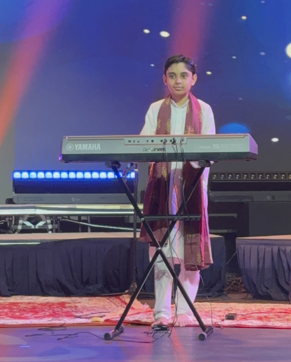 Viaan Ghorpade performing Indian classical rendition of Raag Yaman on keyboard at a concert in Dubai